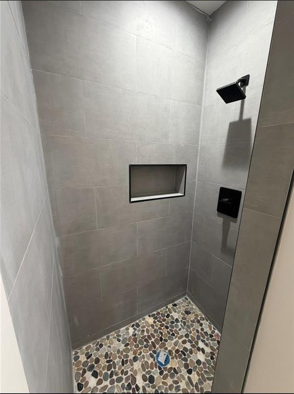 3119 Bellgreen Way Decatur, GA 30032 - Photo 12 of 13 a bathroom with a sink and a shower