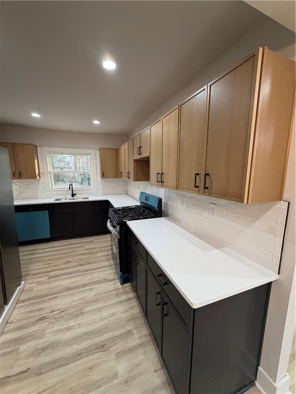 3119 Bellgreen Way Decatur, GA 30032 - Photo 6 of 13 a large kitchen with kitchen island a sink dishwasher a stove a refrigerator and white cabinets with wooden floor