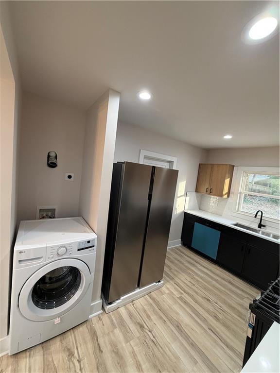 3119 Bellgreen Way Decatur, GA 30032 - Photo 7 of 13 a view of a kitchen with a sink and a washer dryer