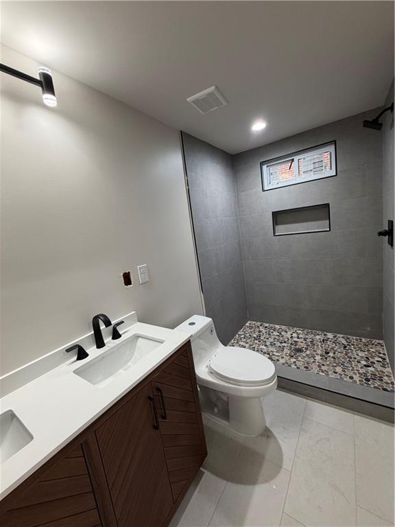 3119 Bellgreen Way Decatur, GA 30032 - Photo 10 of 13 a bathroom with a sink toilet and a mirror