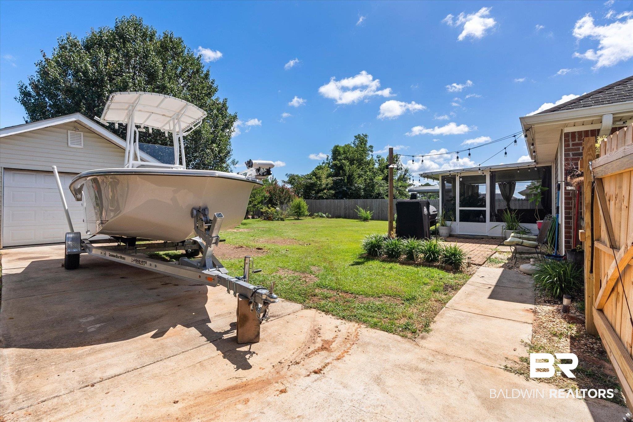 8600 Sable Court Semmes, AL 36575 - Photo 20 of 20 View of yard with a sunroom