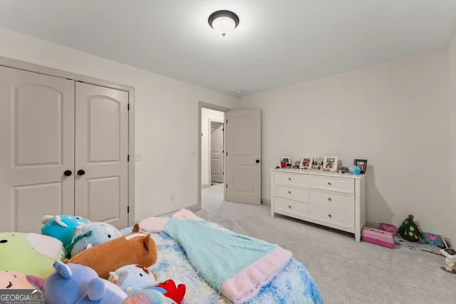 a room with furniture potted plant and a window