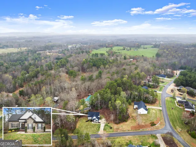 a view of a kitchen from the hallway