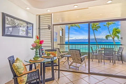 a dining room with furniture and outdoor view