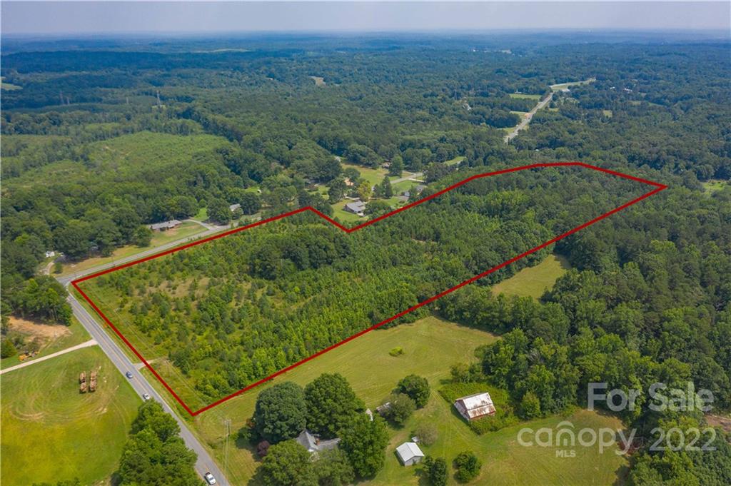 2990 Brantley Road Kannapolis, NC 28083 - Photo 2 of 9 an aerial view of a golf course with a garden