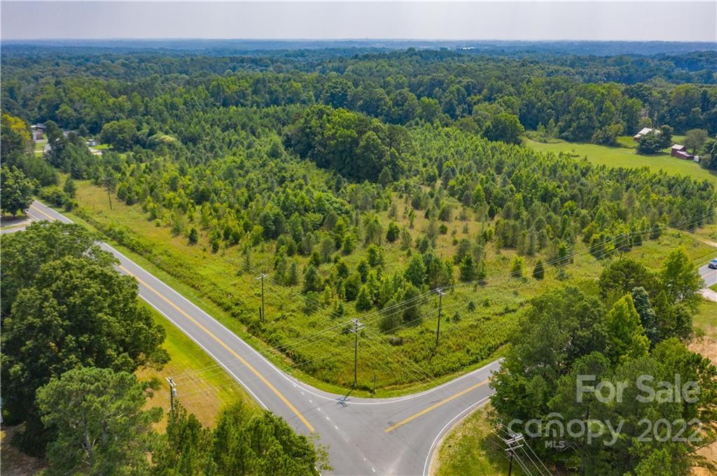 2990 Brantley Road Kannapolis, NC 28083 - Photo 8 of 9 a view of a forest with a street