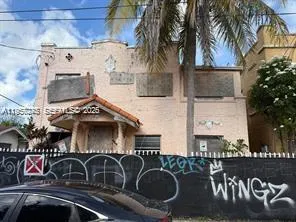 a front view of a house with roof deck