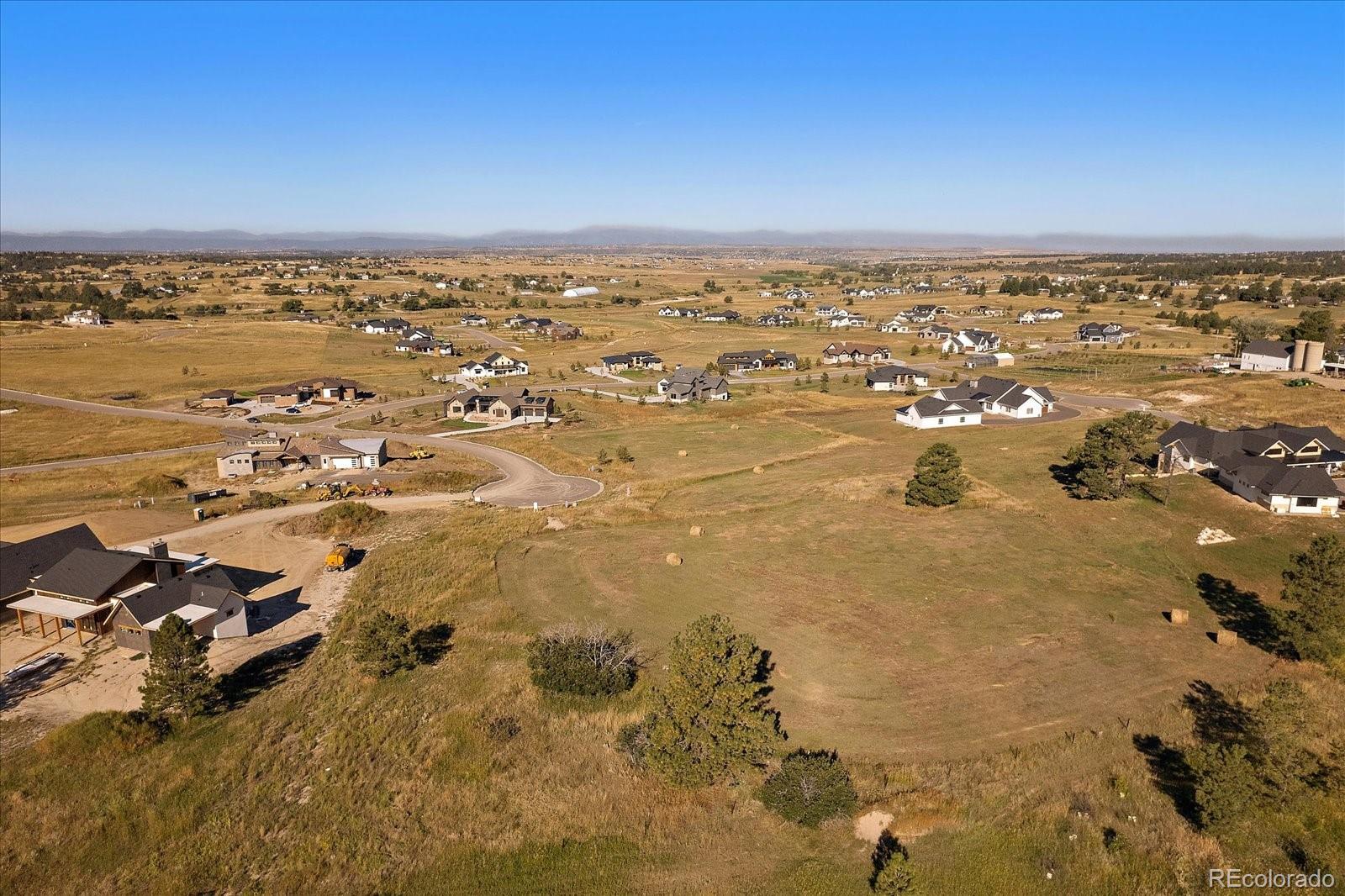 87 Evening Hunt Road Franktown, CO 80116 - Photo 6 of 9 an aerial view of residential building and ocean