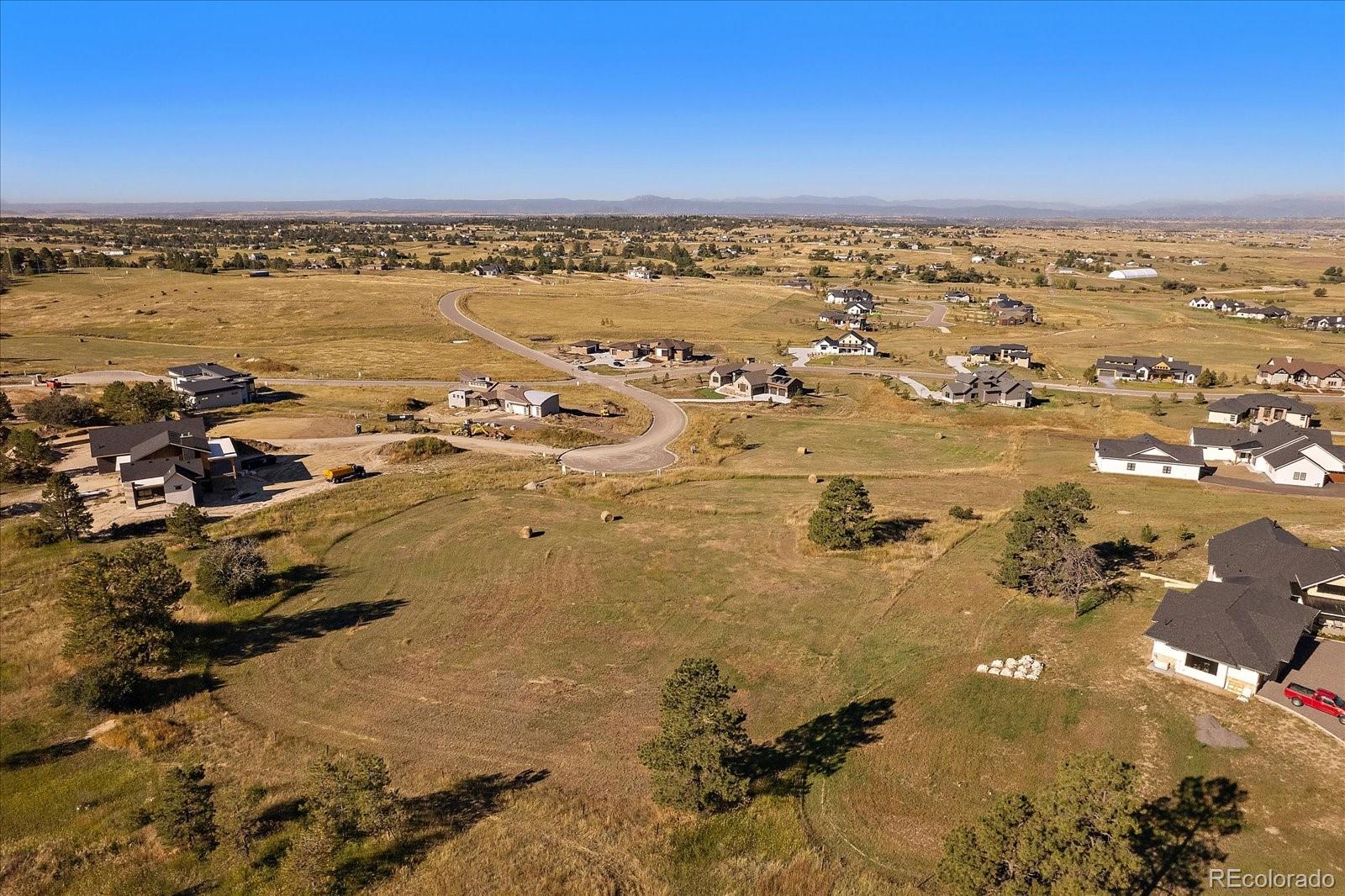 87 Evening Hunt Road Franktown, CO 80116 - Photo 9 of 9 an aerial view of residential building and ocean