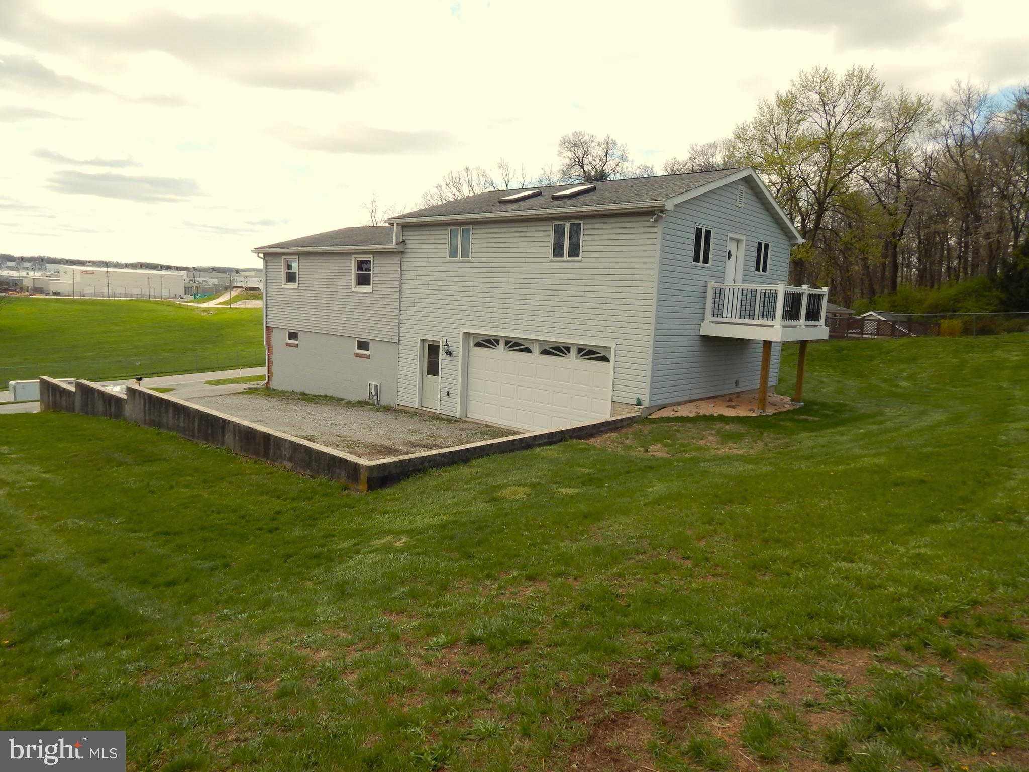 865 Bairs Road York, PA 17408 - Photo 3 of 43 a view of a house with a backyard