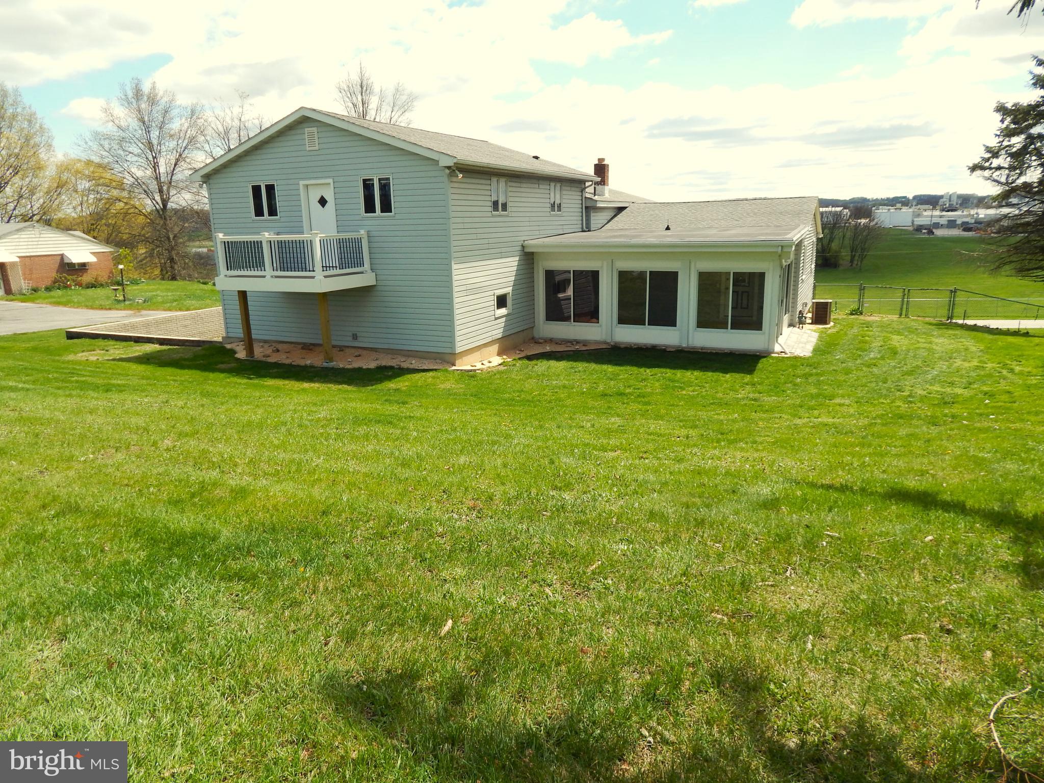 865 Bairs Road York, PA 17408 - Photo 4 of 43 a view of a yard in front of house