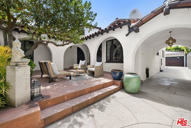 a view of a couches with fire pit