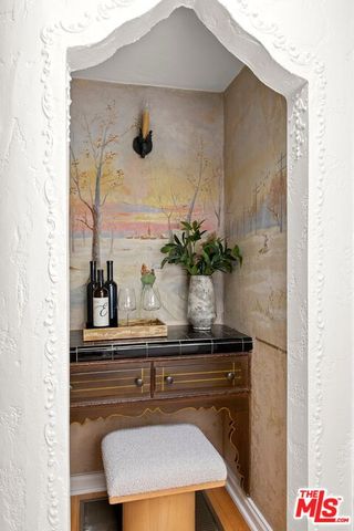 a vase of flowers sitting on a table