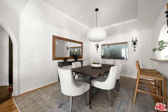 a view of a dining room with furniture