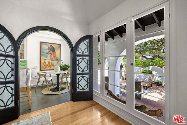 a view of living room with furniture and flat screen tv