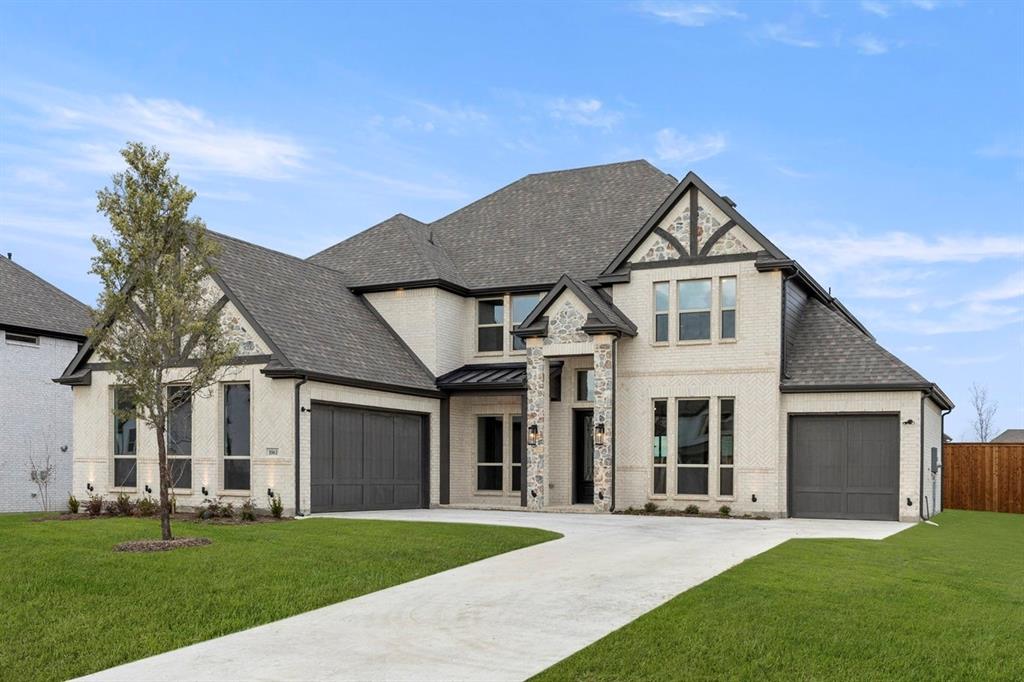 1061 Georgetown Place Prosper, TX 75078 - Photo 2 of 29 front view of a house with a yard