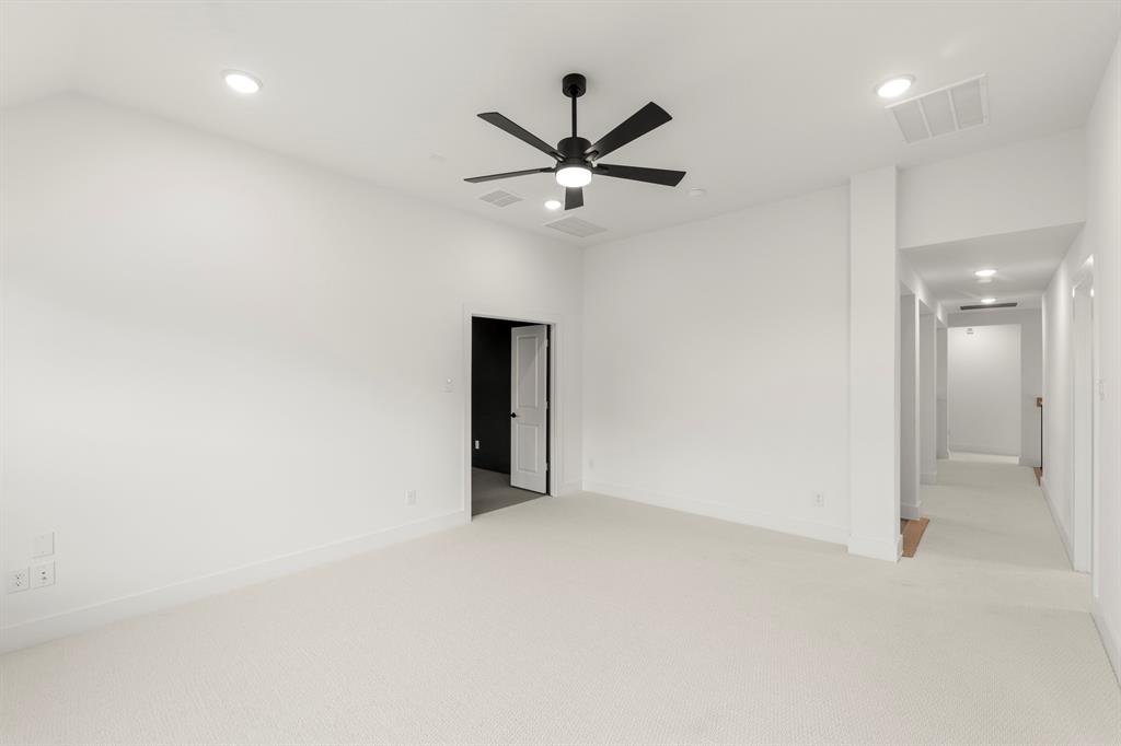 1061 Georgetown Place Prosper, TX 75078 - Photo 23 of 29 an empty room with closet and a ceiling fan