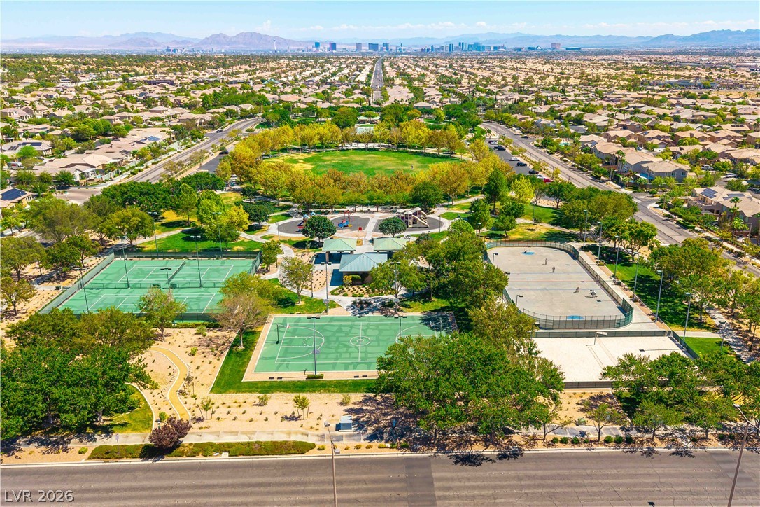 3334 Garden Shower Place Las Vegas, NV 89135 - Photo 29 of 32 A spacious neighborhood park offers diverse recreational facilities and scenic city skyline views.