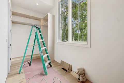 a bathroom with a glass door shower