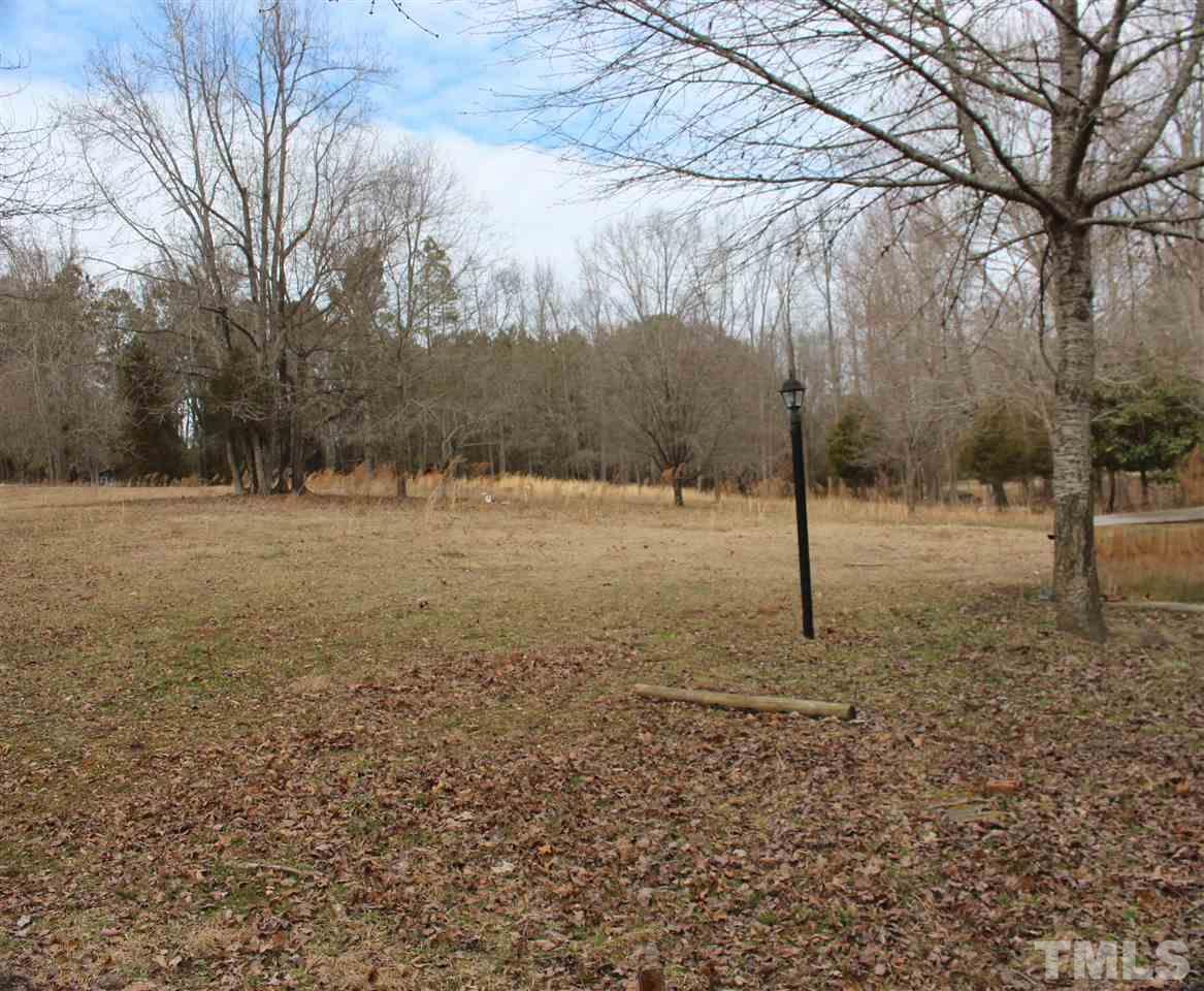 Pope Road Creedmoor, NC 27522 - Photo 6 of 16 a backyard of a house with trees