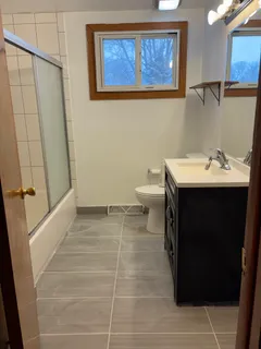 a bathroom with a sink and a toilet
