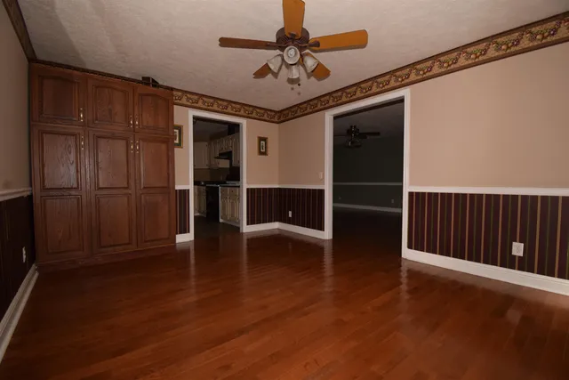 a view of a livingroom with wooden floor