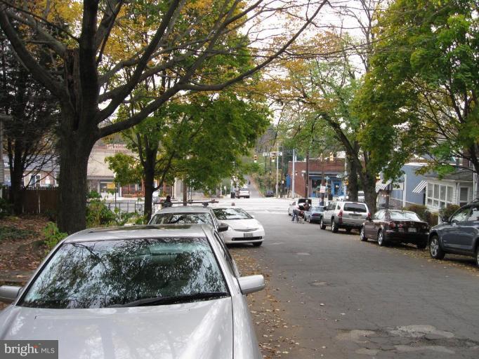 4513 Schenley Road Baltimore, MD 21210 - Photo 3 of 7 a view of street with parked cars