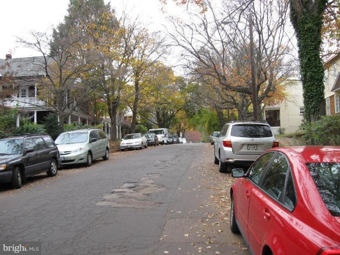 4513 Schenley Road Baltimore, MD 21210 - Photo 4 of 7 a view of street with parked cars