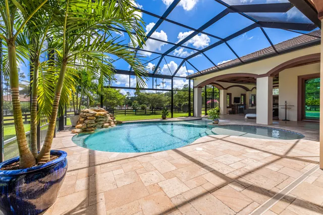 a view of a building with a backyard