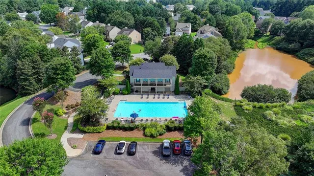 an aerial view of a house with outdoor space and street view