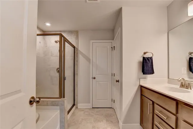 a bathroom with a sink and mirror
