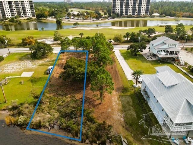 14124 River Road Perdido Key, FL 32507 - Photo 3 of 17 a view of a swimming pool with a patio