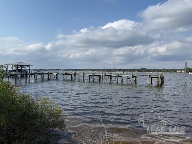 14124 River Road Perdido Key, FL 32507 - Photo 10 of 17 a view of a terrace with lawn chairs