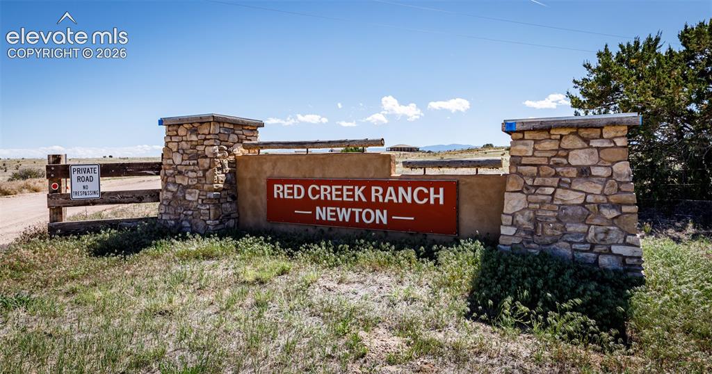 1120 Newton Road Pueblo, CO 81005 - Photo 46 of 46 a sign board with a building in the background