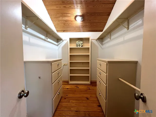 a view of house with trees in the background