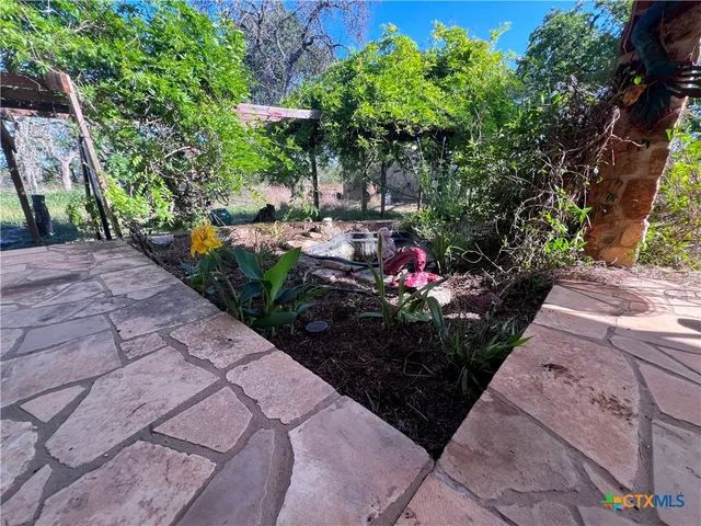 a bedroom with a bed and a walk in closet