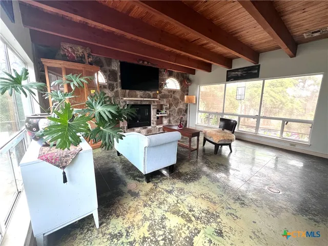 a kitchen with stainless steel appliances white cabinets and a stove