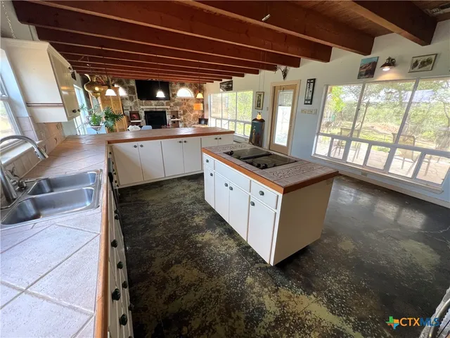 a view of hallway with wooden floor