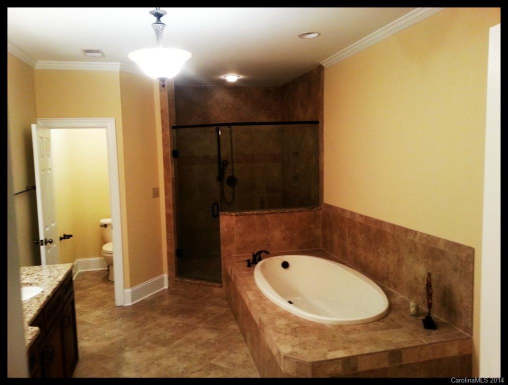 2420 High Ridge Road Charlotte, NC 28270 - Photo 14 of 24 a bathroom with a sink and a mirror
