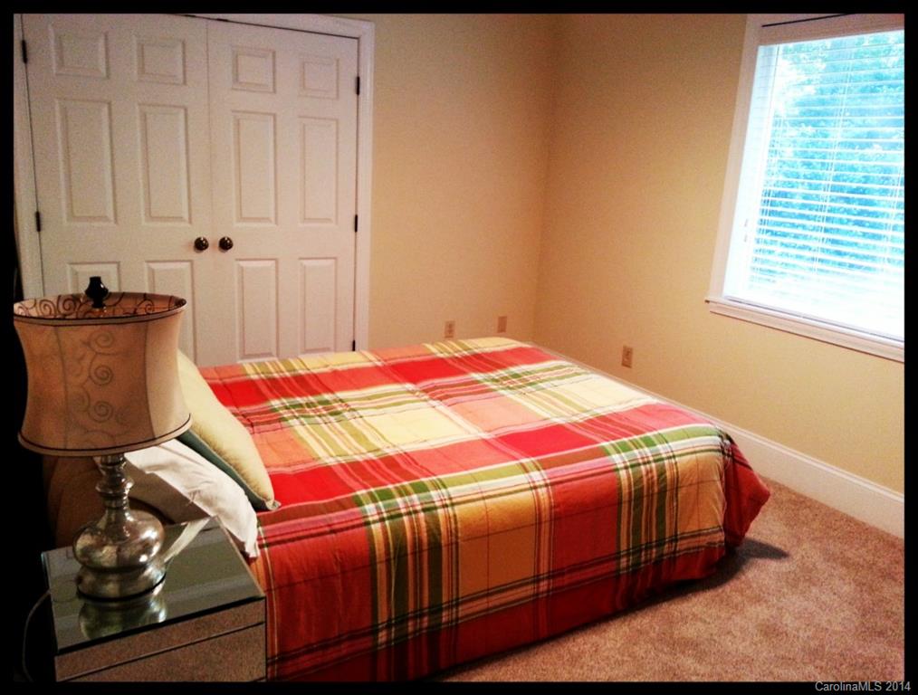 2420 High Ridge Road Charlotte, NC 28270 - Photo 22 of 24 a bedroom with a bed and a window