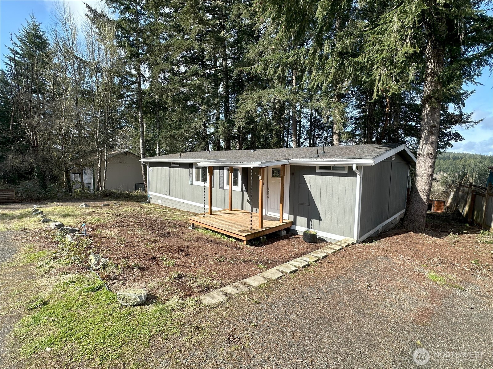 a view of a house with a yard