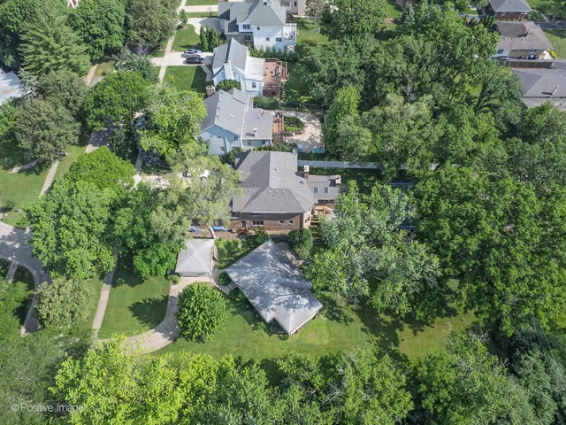 an aerial view of a house with a garden