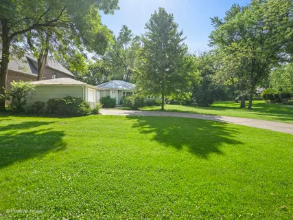 a view of a house with a big yard