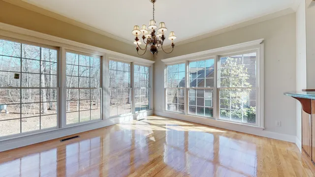 a view of a kitchen with a sink and microwave
