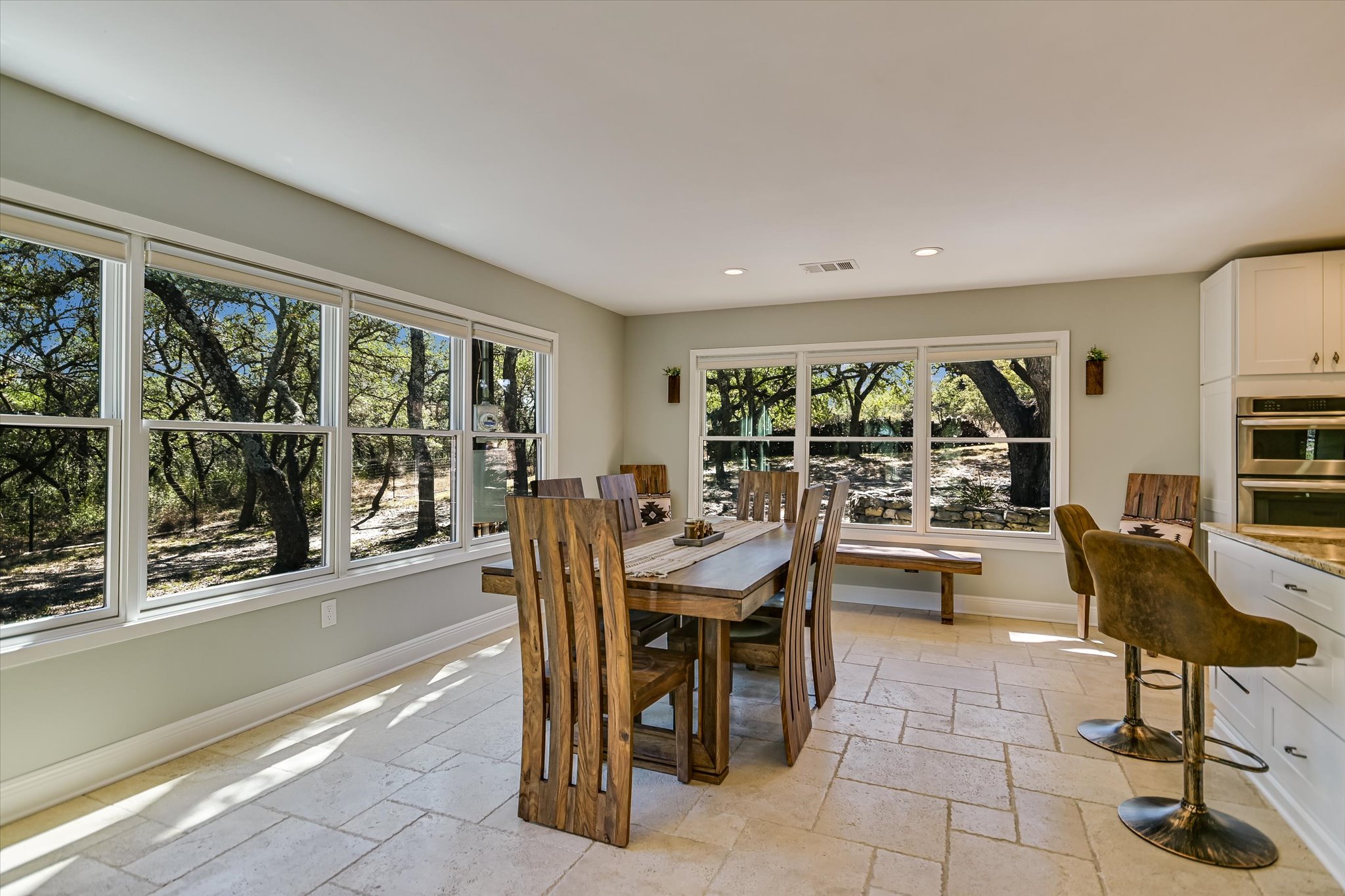 878 Ranch Road 2766 Johnson City, TX 78636 - Photo 16 of 40 a view of a dining room with furniture window and outside view