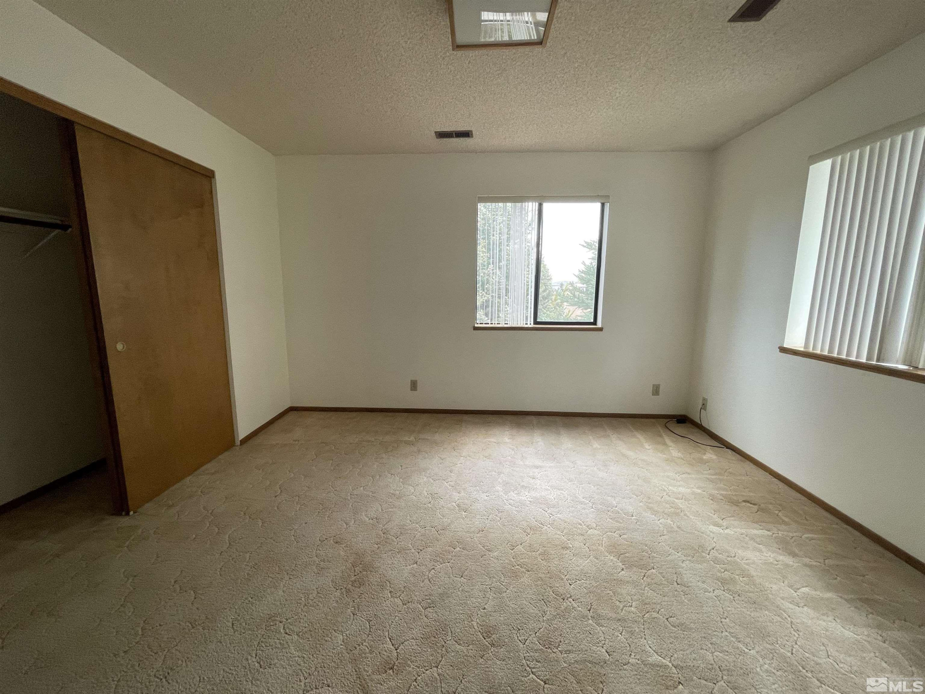 2500 Bryce Canyon Lane Reno, NV 89509 - Photo 14 of 23 an empty room with windows