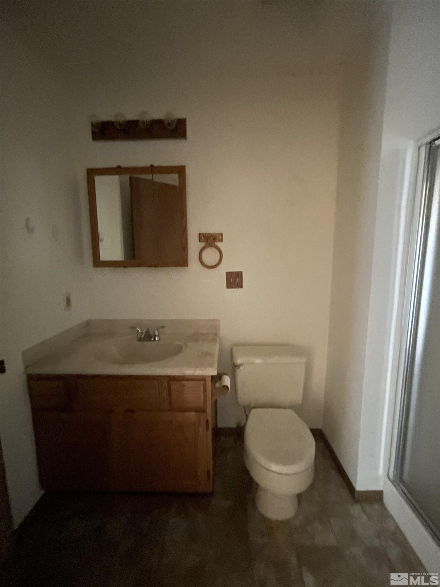 2500 Bryce Canyon Lane Reno, NV 89509 - Photo 19 of 23 a bathroom with a toilet a sink and mirror