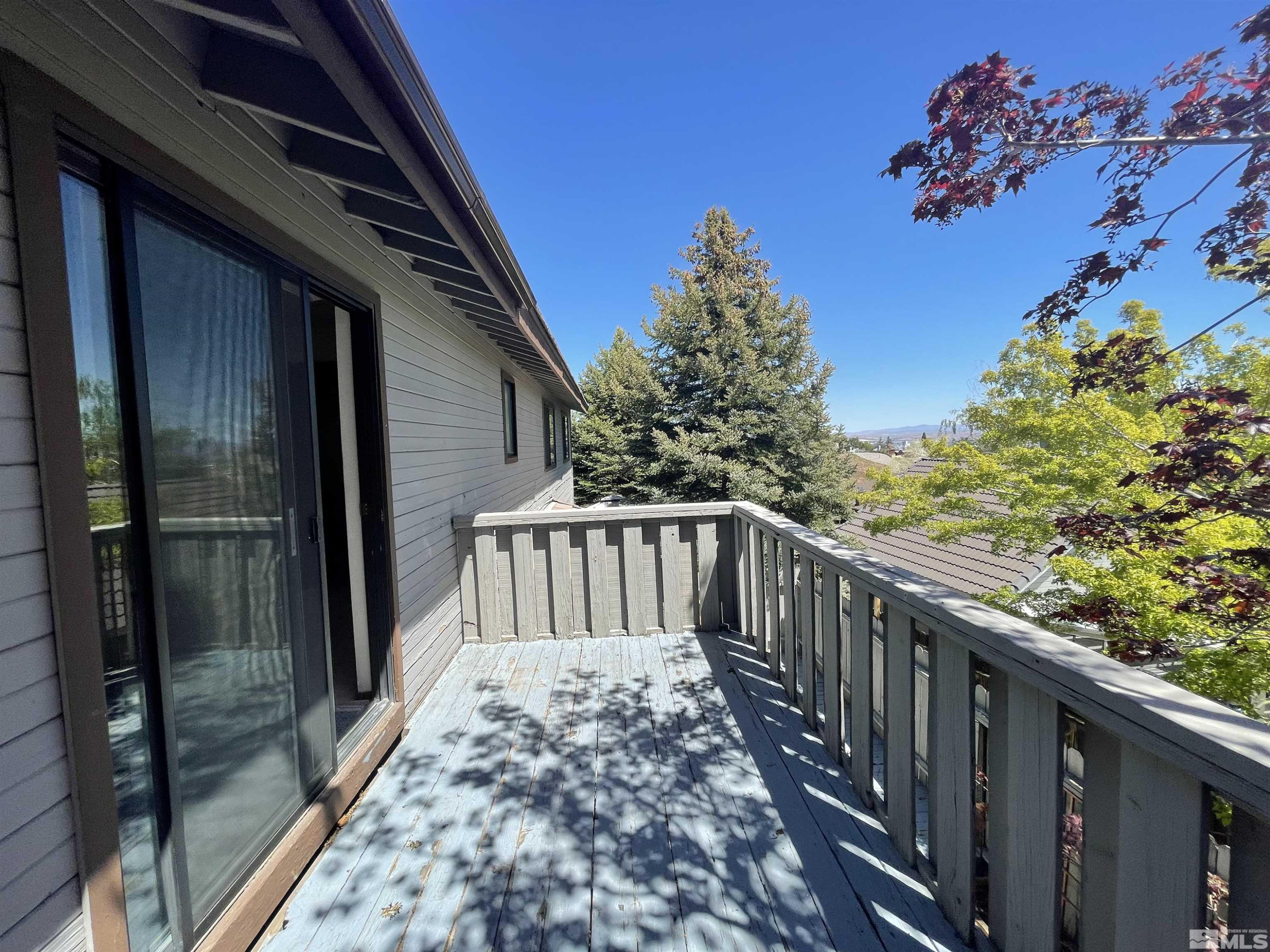 2500 Bryce Canyon Lane Reno, NV 89509 - Photo 21 of 23 a view of balcony with wooden floor and fence