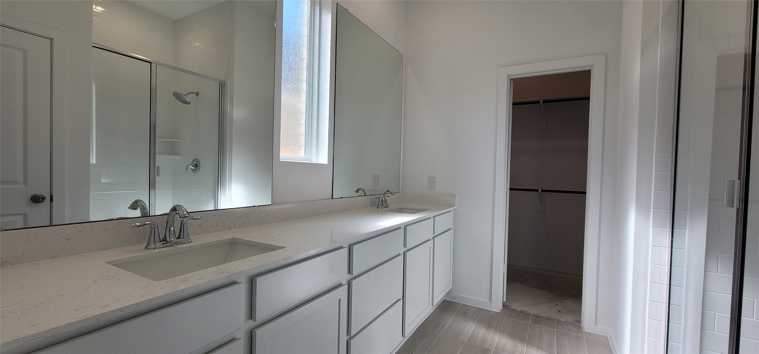 1035 Blue Stone Drive Beasley, TX 77417 - Photo 11 of 24 a bathroom with a double vanity sink and mirror