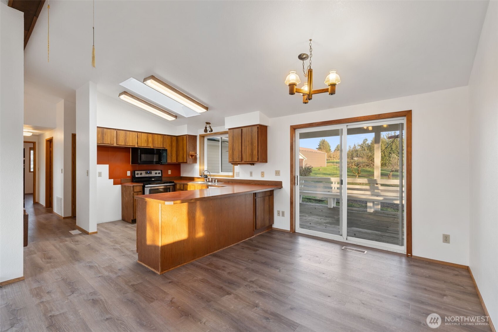 568 A Cemetery Road Winlock, WA 98596 - Photo 11 of 38 a kitchen with stainless steel appliances granite countertop a refrigerator and a sink